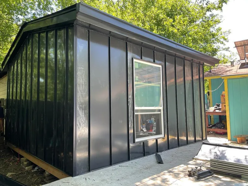 Black standing seam metal wall panels for Roof Inspection in Mead Valley