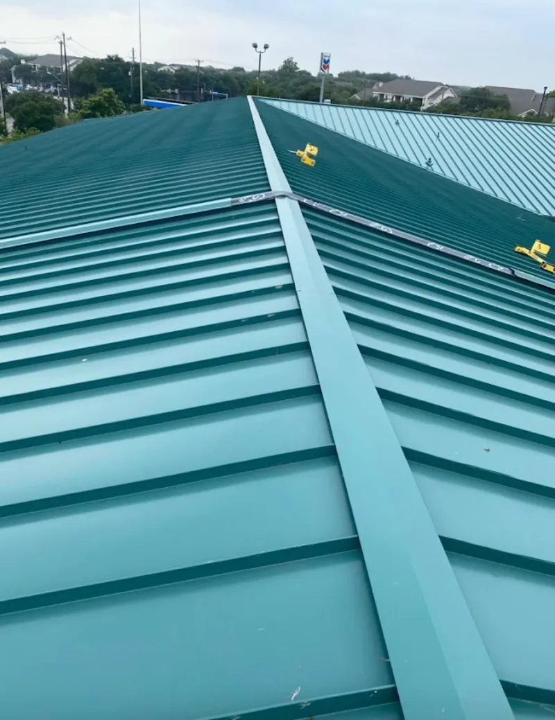 Green commercial metal roof ridge and valley for Metal Roof Repair in Mead Valley